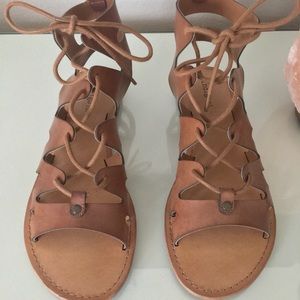 Brown lace up flats